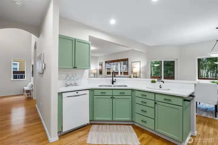 kitchen with view into living and dining room