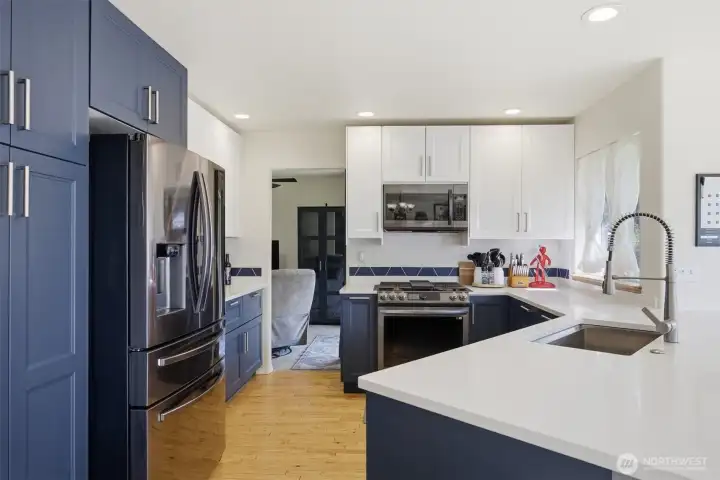 Remodeled kitchen with quartz countertops, all new SS appliances