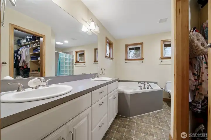 Primary bathroom with jetted tub for ultimate relaxation.
