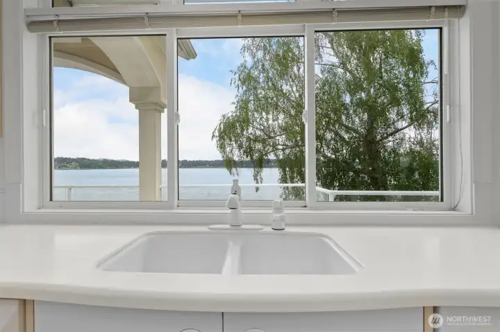There is a 180 degree view of the water from almost every room, including the kitchen.  If one has to do dishes, at least there is a gorgeous view to ease the job.  :-)