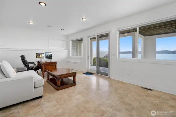 Family room on the lower level with its own entry and also a view.