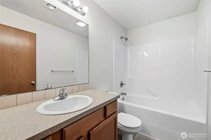 Upstairs full bathroom in the hall for the two bedrooms