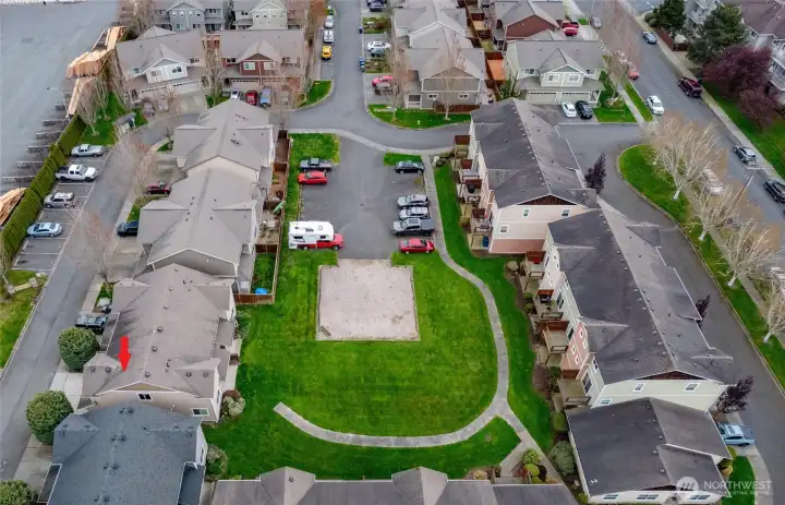 Green space belongs to the condo association. Great for kiddos or pets!