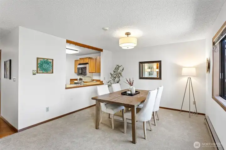 A large space easily accessible to the kitchen. New carpet and paint throughout.