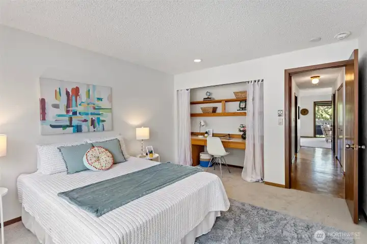 A clever use of space with a built-in office nook and shelving for those who work from home.