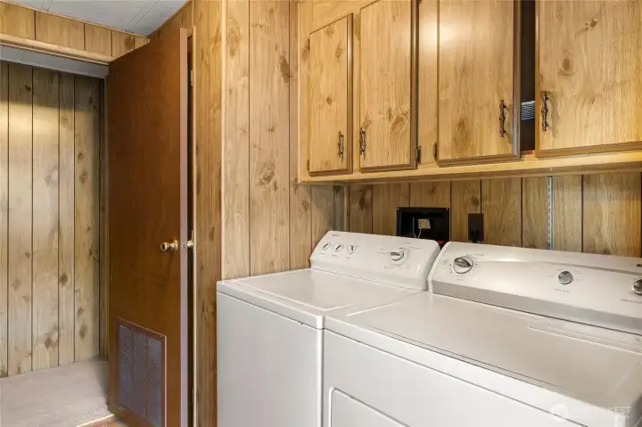 Utility room with washer and dryer