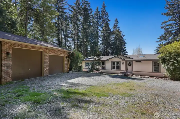 2 car garage & 2 car carport has heat & insulation with plumbing for a galley kitchen & w/d hookups + 3/4 bathroon