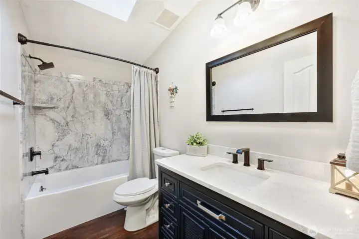 Hallway balth room ins beautifully updated