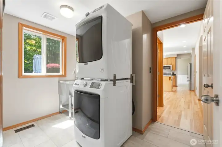 New floors in the spacious laundry room.