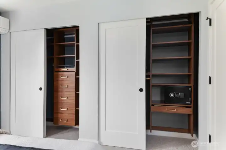 Custom California Closets system with generous shelving, hanging space, and organized storage solutions delivering exceptional functionality in the full-floor primary suite.