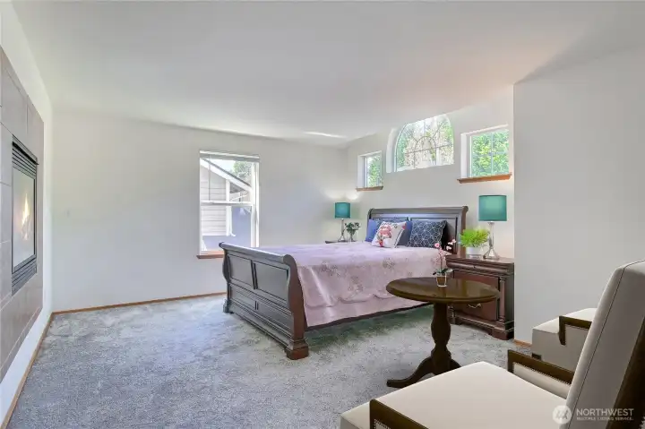 Primary bedroom has sitting area - virtually staged