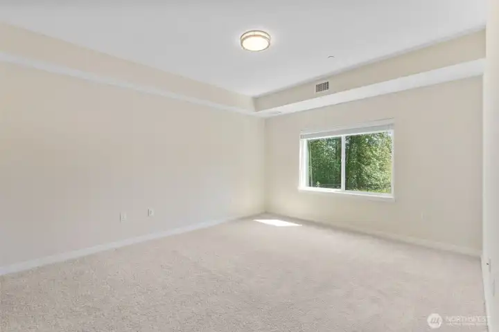Master suite with attached bathroom and large walk in closet
