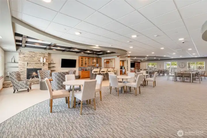 Common area with gas fireplace, and bar