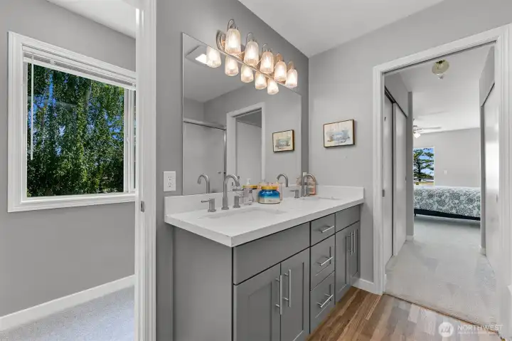 Remodeled primary bathroom. Remodeled primary bathroom.