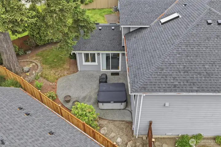 Drone photo of patio and spa. Drone photo of patio and spa.