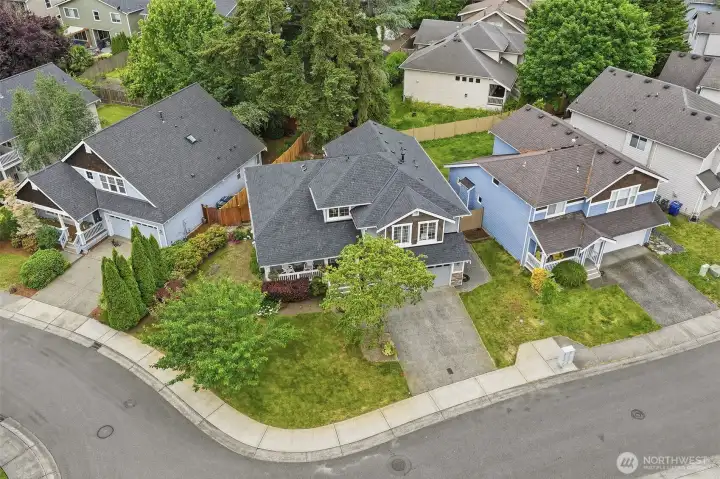 Large corner lot with sidewalks. Large corner lot with sidewalks.