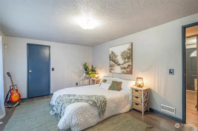 PRIMARY BEDROOM | There's plenty of room here for a king-sized bed and dressers.