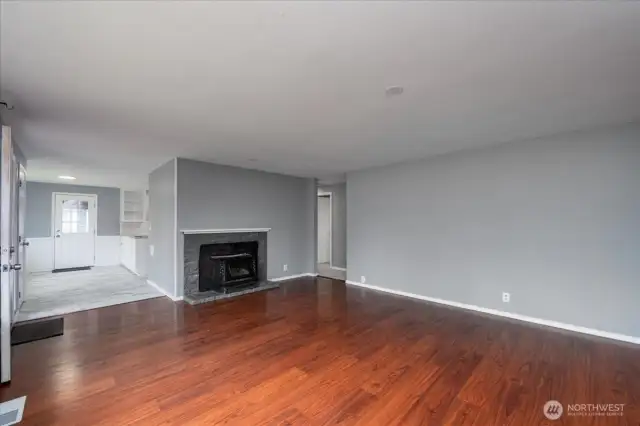 Large living room with fireplace.