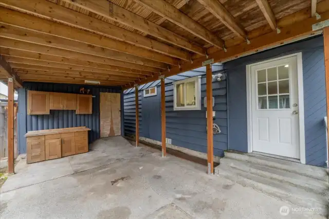 Access to the kitchen from the carport as well as access to the attached storage shed.