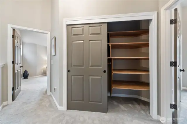 Hall closet with lots of storage