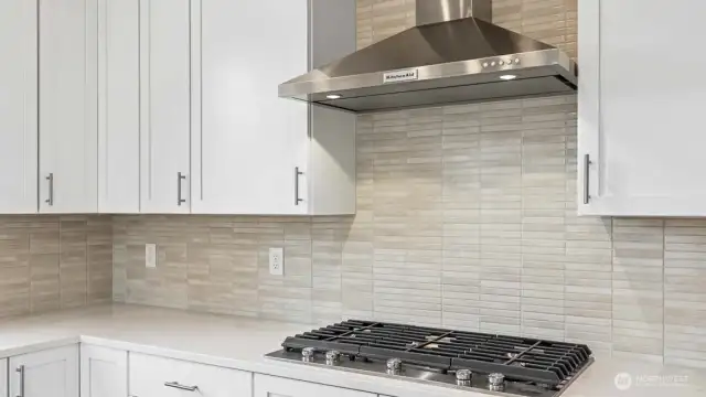 Gas cooktop! Upgraded white cabinetry.