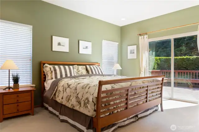 Largest of the  en-suite bedrooms in the home.  This one has sliders leading to back deck