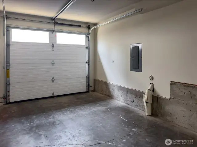 Attached 1-car garage with room in electrical panel to add dedicated EV outlet.