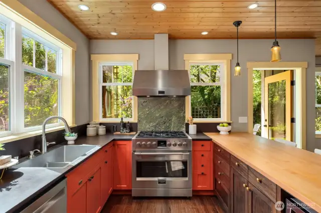 Stainless appliances including a Fulgor Milano dual-fuel range with 6 burners