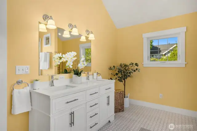 Large primary bathroom with vaulted ceiling