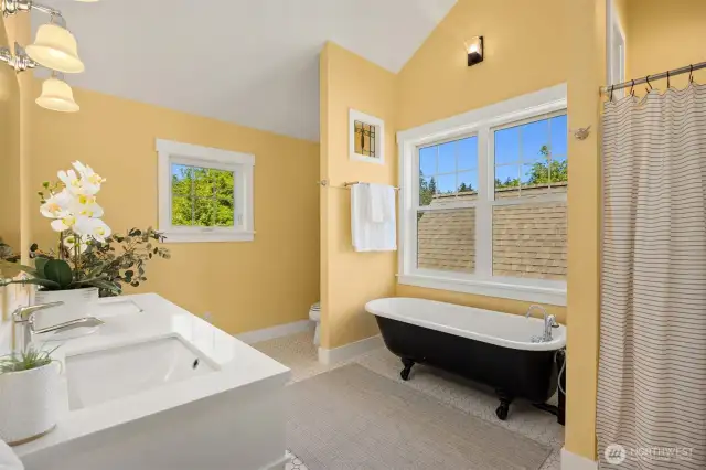 Shower adjacent to the tub