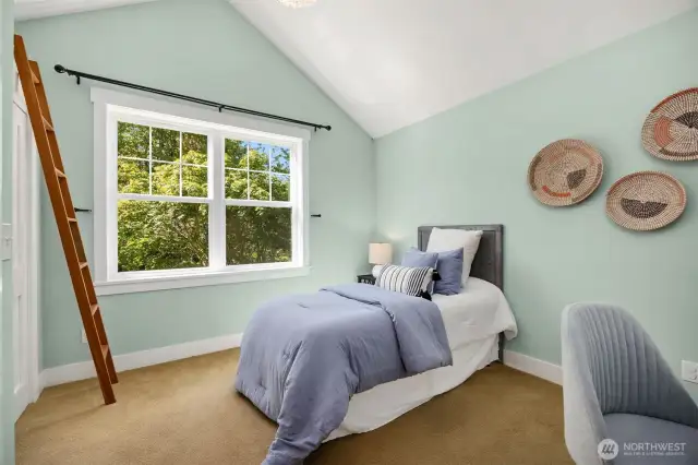 Second upstairs bedroom with loft space above the cloaet
