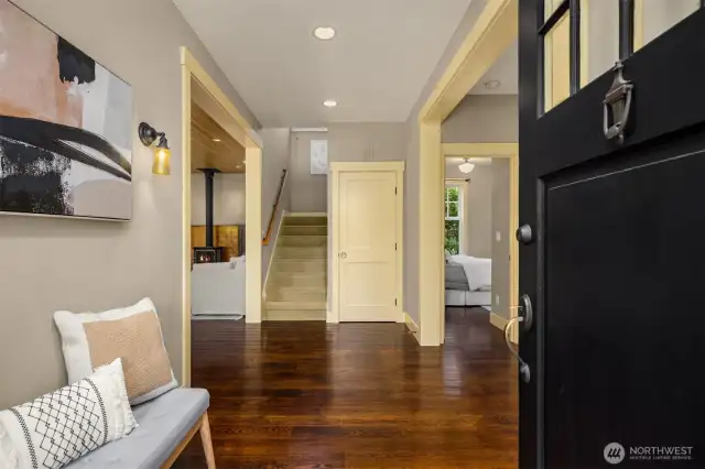 Enter to rich oak floors, 9-ft ceilings, and elegant cased openings