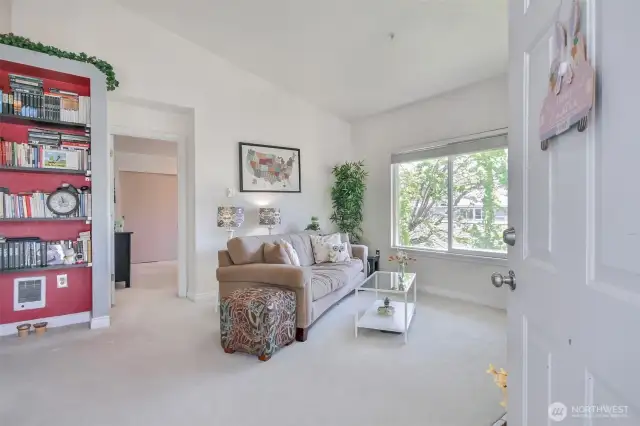 Living room view. Built-in bookshelf