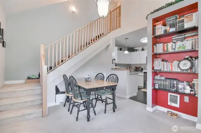 Dining area and staircase to upper level