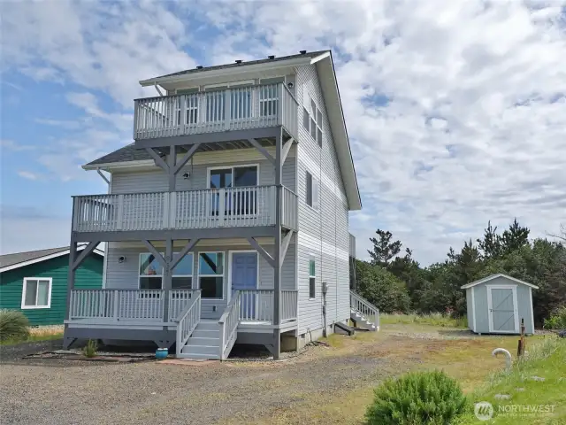 Enjoy this Ocean View (partial, but yet expansive -- a must see) home by the Beach.