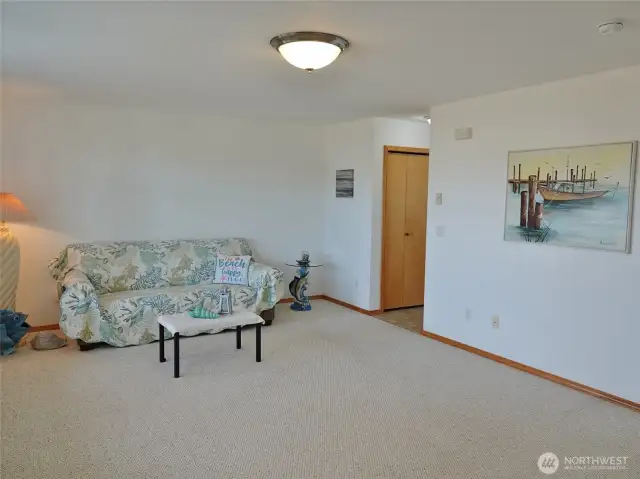 Comfortable Living Room, which leads into the Kitchen/Dining Room.