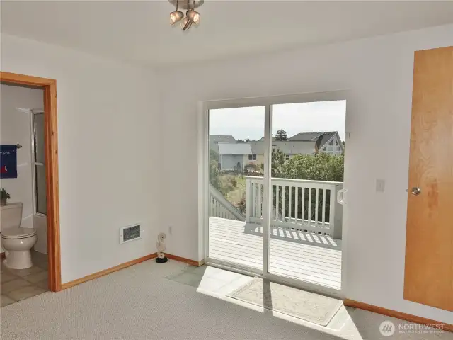 2nd-level: 2nd Bedroom w/ private bath and a slider to the Rear Deck.