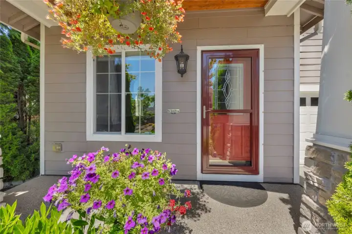 Cozy front porch with room for a bistro table and two chairs.