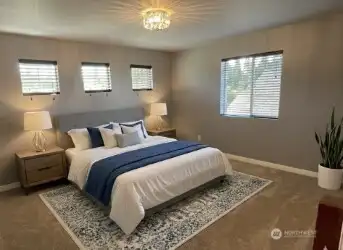 Second floor loft virtually staged as a fourth bedroom.