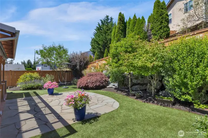 Low maintenance! Synthetic Turf needs no watering or mowing!