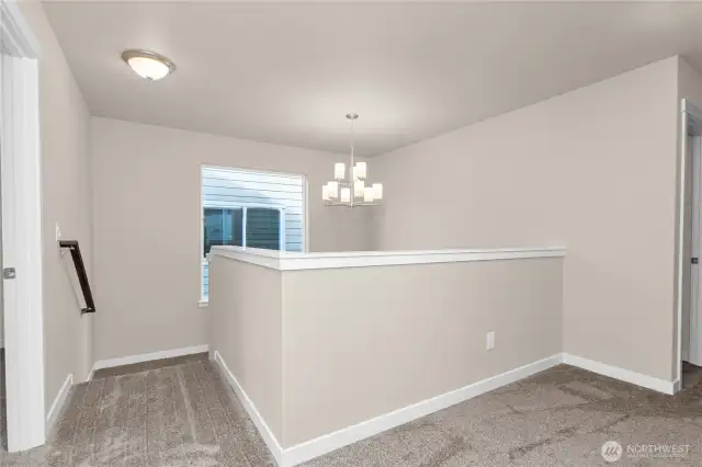 Second floor landing with ample space and plenty of light.