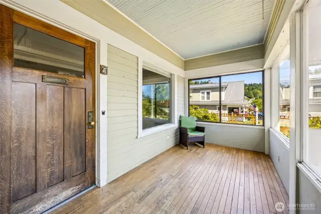 Sun porch includes hardwood flooring!