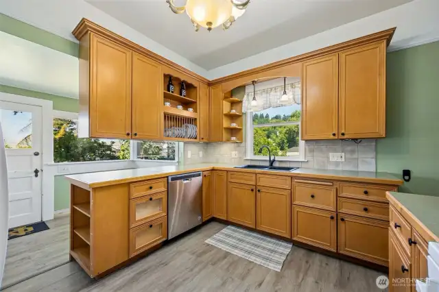 Updated kitchen with eating space on the other side of the cabinets