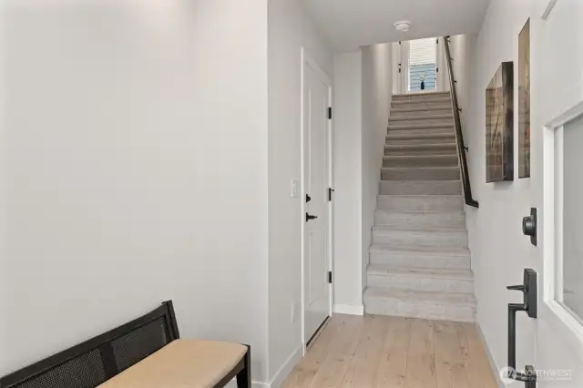Wide entry with easy access to 2 car garage.