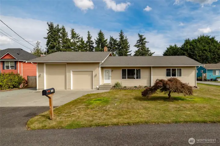 Lovely level lot with mature Japanese Maple.
