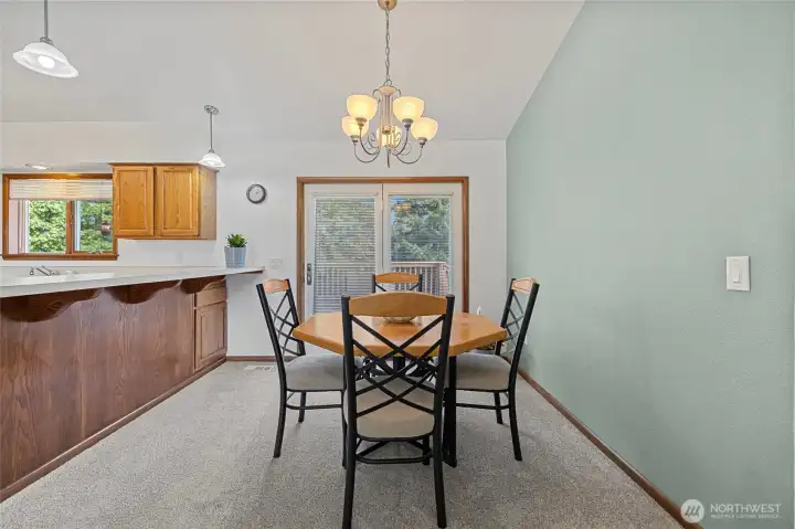 Dining area with access to the large rear deck.