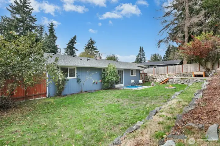 Level backyard with terraces for added garden interest.