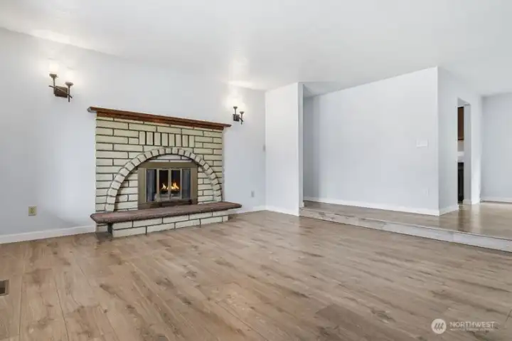 Photo of living room (unstaged), cozy gas fireplace to keep you warm and toasty on a fall or winter eve...