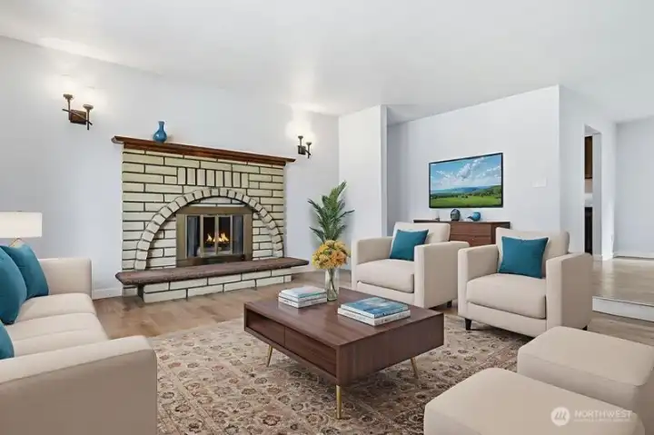 Here is a photo of the living room virtually staged just to give you some idea of how much space this room offers