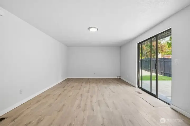 Spacious family room with slider to back patio
